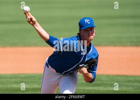 Kansas City Royals starting pitcher Brady Singer (51) during a spring training game against the Cleveland Indians, Sunday, March 29, 2021, in Phoenix, Stock Photo