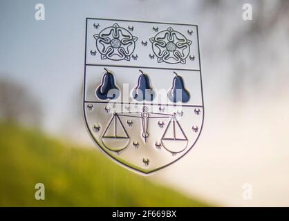 Reflection of Castle Mound, in Nuffield Collage Name Plaque, Oxford University, Oxford, Oxfordshire, England, UK, GB.