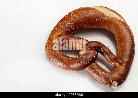 Baking pretzels on a white background. Isolate. White background. Stock Photo