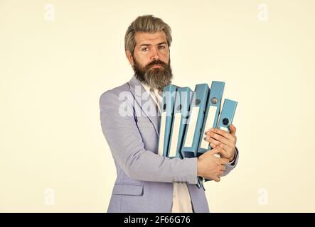 Recounting and financial control. Work overtime. Project Curator. Project manager. Project documentation. Deadline concept. Man carry folders. Work Stock Photo