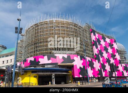 Scaffolding is erected around the iconic and distinctive Selfridges building in Birmingham whilst the aluminium discs undergo cleaning and maintenance Stock Photo