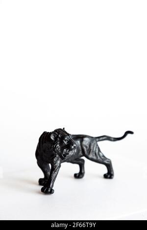 Black tiger toy isolated on white background. Stock Photo