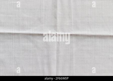 Soft light gray natural linen texture. Crumpled fabric background Stock Photo