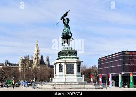 Vienna, Austria. Equestrian statue of Archduke Charles (by A. D. Fernkorn with the provisional parliament building and the town hall in the background Stock Photo