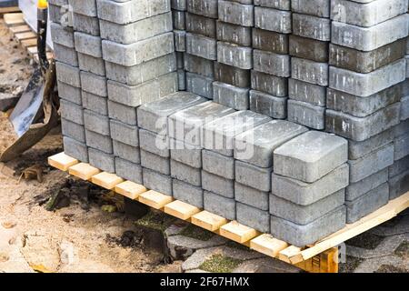 Concrete blocks prepared for the paving of a street Stock Photo