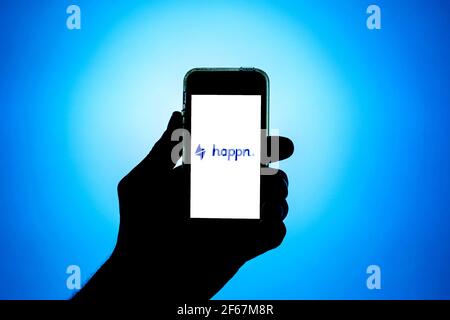 In this photo illustration, the Happn app seen displayed on a smartphone screen. Stock Photo