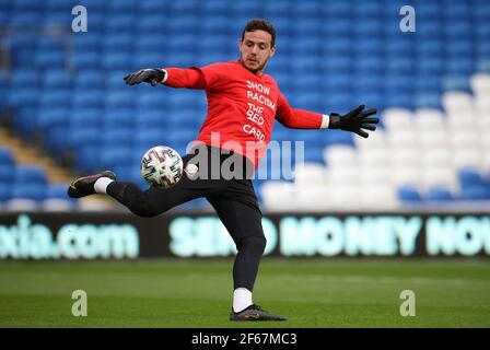 Wales goalkeeper Danny Ward warms up in a ‘Show Racism the Red Card’ t shirt during the 2022 FIFA World Cup Qualifying match at Cardiff City Stadium, Wales. Picture date: Tuesday March 30, 2021. Stock Photo