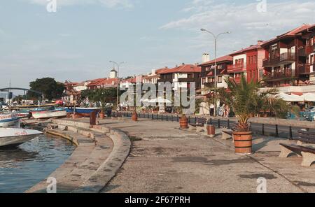 Nessebar, Bulgaria - July 20, 2014: Street view of Nessebar old town. Ordinary people walk the street Stock Photo