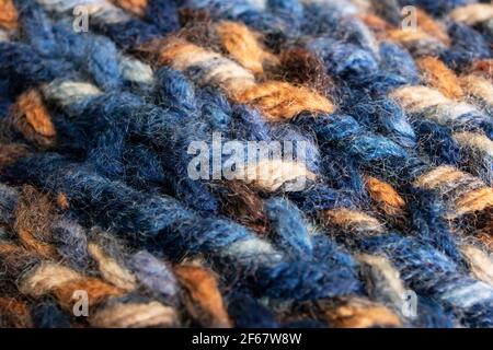 Large loops on blue wool knit fabric Stock Photo
