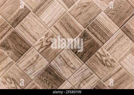 Wooden brown mosaic floor texture, interior design wood parquet background. Stock Photo