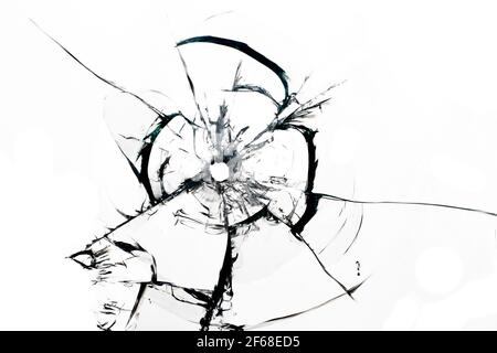 Texture of cracks on the glass from the shot. Bullet hole in glass, texture for design. Stock Photo
