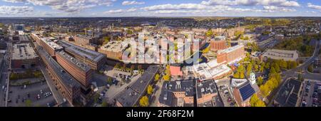 Lowell historic downtown, Canal, Marrimack River and historic Mills panorama aerial view in fall in Lowell, Massachusetts, MA, USA. Stock Photo