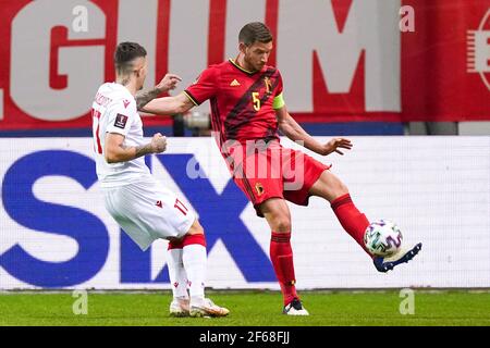 Leuven, Belgium. 30th Mar, 2021. LEUVEN, BELGIUM - MARCH 30: Vitali Lisakovich of Belarus and Jan Vertonghen of Belgium during the FIFA World Cup 2022 Qatar Qualifier match between Belgium and Belarus at Den Dreef on March 30, 2021 in Leuven, Belgium (Photo by Jeroen Meuwsen/Orange Pictures) Credit: Orange Pics BV/Alamy Live News Stock Photo