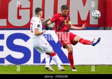 LEUVEN, BELGIUM - MARCH 30: Vitali Lisakovich of Belarus and Jan Vertonghen of Belgium during the FIFA World Cup 2022 Qatar Qualifier match between Be Stock Photo