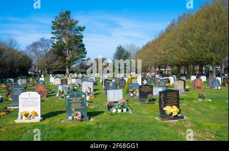 Graveyard and gravestones in a large British cemetery at Littlehampton Cemetery, Littlehampton, West Sussex, England, UK. Stock Photo