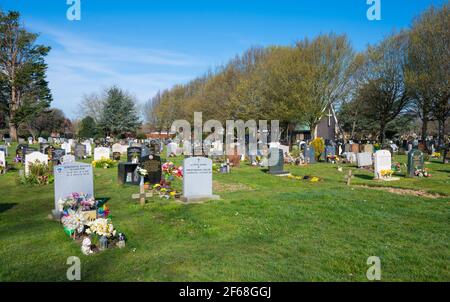 Graveyard and gravestones in a large British cemetery at Littlehampton Cemetery, Littlehampton, West Sussex, England, UK. Stock Photo