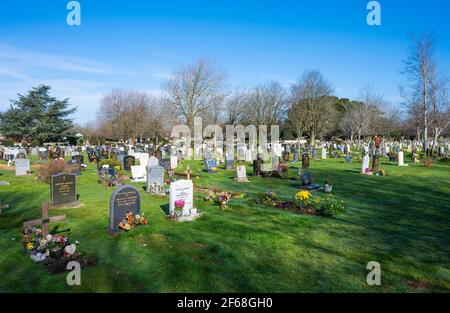 Graveyard and gravestones in a large British cemetery at Littlehampton Cemetery, Littlehampton, West Sussex, England, UK. Stock Photo