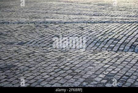 Close-up image of the ground of a square covered by setts Stock Photo