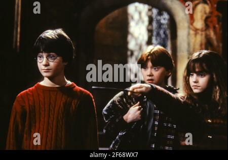 Daniel Radcliffe, Rupert Grint, Emma Watson, 'Harry Potter and the Philosopher's Stone' (2001). Photo Credit: Peter Mountain/Warner Bros. Pictures/THA. File Reference # 34082-1239THA Stock Photo