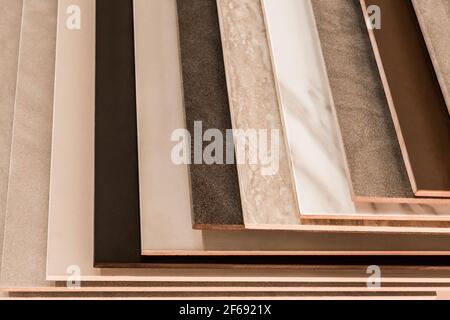 Samples interior design of colored decorative ceramic tiles texture background in hardware store. Stock Photo