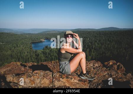 Woman Poses on Scenic Mountian Top Early Morning Stock Photo