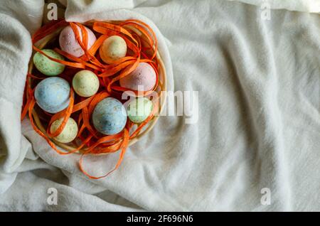 Easter eggs in a basket, free space Stock Photo