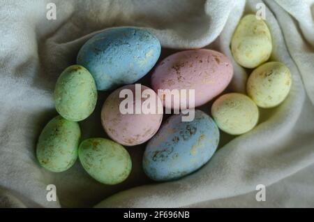Easter eggs on a light tablecloth, close-up Stock Photo