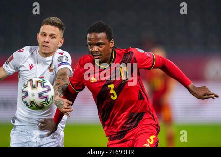 LEUVEN, BELGIUM - MARCH 30: Dedryck Boyata of Belgium and Vitali Lisakovich of Belarus during the FIFA World Cup 2022 Qatar Qualifier match between Be Stock Photo