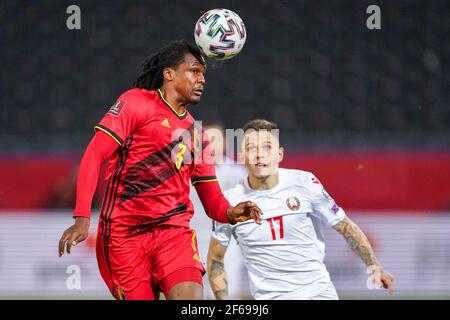 LEUVEN, BELGIUM - MARCH 30: Dedryck Boyata of Belgium and Vitali Lisakovich of Belarus during the FIFA World Cup 2022 Qatar Qualifier match between Be Stock Photo