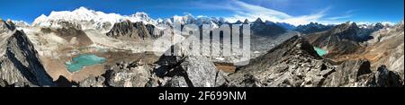 Beautiful panoramic view of Mount Cho Oyu and Cho Oyu base camp, mountain lakes, Everest, Lhotse, Gyachung Kang, Ngozumba and Gyazumba glaciers - Saga Stock Photo