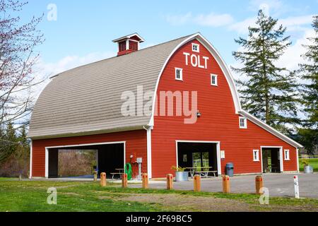 Red Barn at Tolt McDonald Park in Carnation Washington within the King County Parks System located in the Snoqualmie Valley on the banks of the river Stock Photo