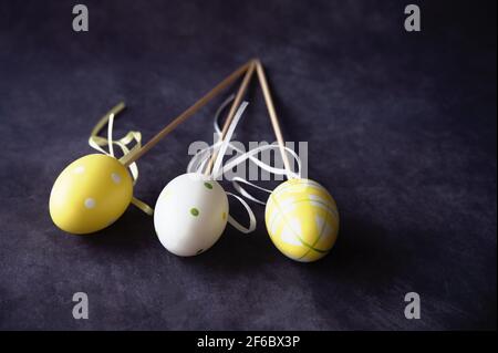 Colorful Easter eggs against black background Stock Photo