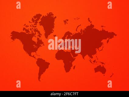 World map isolated on red wall background Stock Photo