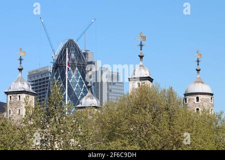 London Center, London, UK - May 4th, 2018: Ongoing office constructions at Central London with Tower of London's towers in the foreground. Stock Photo