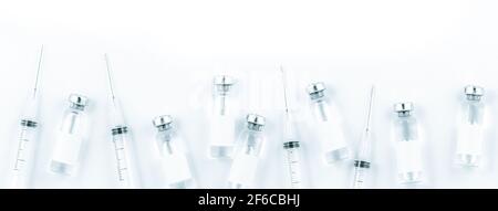 Close-up of shingle vaccine vials and syringes background Stock Photo