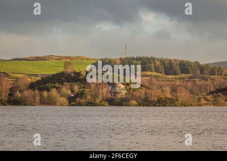 Eco Bothy on Loch Ken, surrounded by woodland, Dumfries and Galloway, Scotland Stock Photo