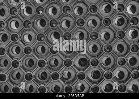 Dark black round rubber pattern to cover the floor. Stock Photo