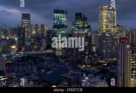 Tokyo, Japan - October 23, 2019: The skyscrapers of ARK Hills as seen from the Tokyo Tower observation deck at night time. Minato city. Tokyo. Japan Stock Photo