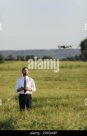 Male agronomist with a quadcopter Stock Photo