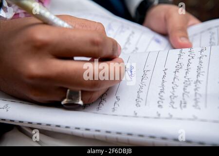 Pakistani Muslim Groom signature Marriage contract paper. Nikah Nama Stock Photo