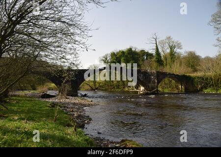 Oliver Cromwell's crossing of the river hodder bridge in 1648 enroute to the battle of Preston -English civil war. Stock Photo