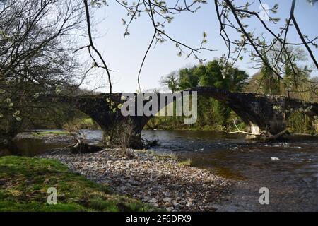 Oliver Cromwell's crossing of the river hodder bridge in 1648 enroute to the battle of Preston -English civil war. Stock Photo