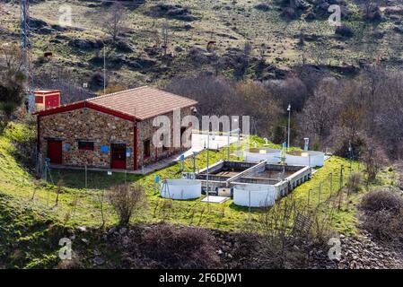 Small sewage treatment plant in countryside. Stock Photo