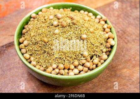 Local food of Canarian islands, dried herbal mix with coriander seeds for mojo cilantro condiment sause close up Stock Photo