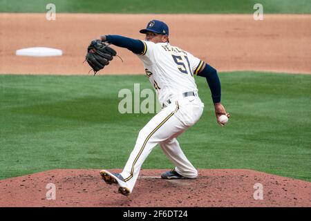 Milwaukee Brewers relief pitcher Freddy Peralta (51) during a spring training game against the Chicago White Sox, Friday, March 26, 2021, in Phoenix, Stock Photo