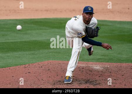 Milwaukee Brewers relief pitcher Freddy Peralta (51) during a spring training game against the Chicago White Sox, Friday, March 26, 2021, in Phoenix, Stock Photo