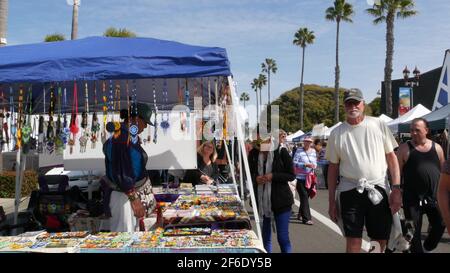 Oceanside, California USA -20 Feb 2020 People walking on marketplace, customers on farmers market. Buyers support business, vendors sell locally produ Stock Photo