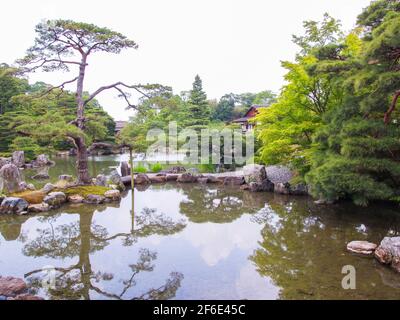 The view of the gardens and pond on a grey day. At Hachijō-no-miya royal villa in Kyoto, Japan. Stock Photo