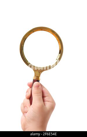 Magnifying glass in child hand on white background, isolate Stock Photo