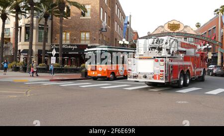 San Diego, California USA -31 Jan 2020: Red fire engine on street of city near Los Angeles. Firefighters vehicle or truck, american Fire Department ca Stock Photo